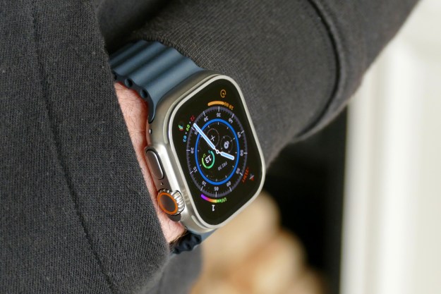 The Apple Watch Ultra on a man's wrist in a pocket.