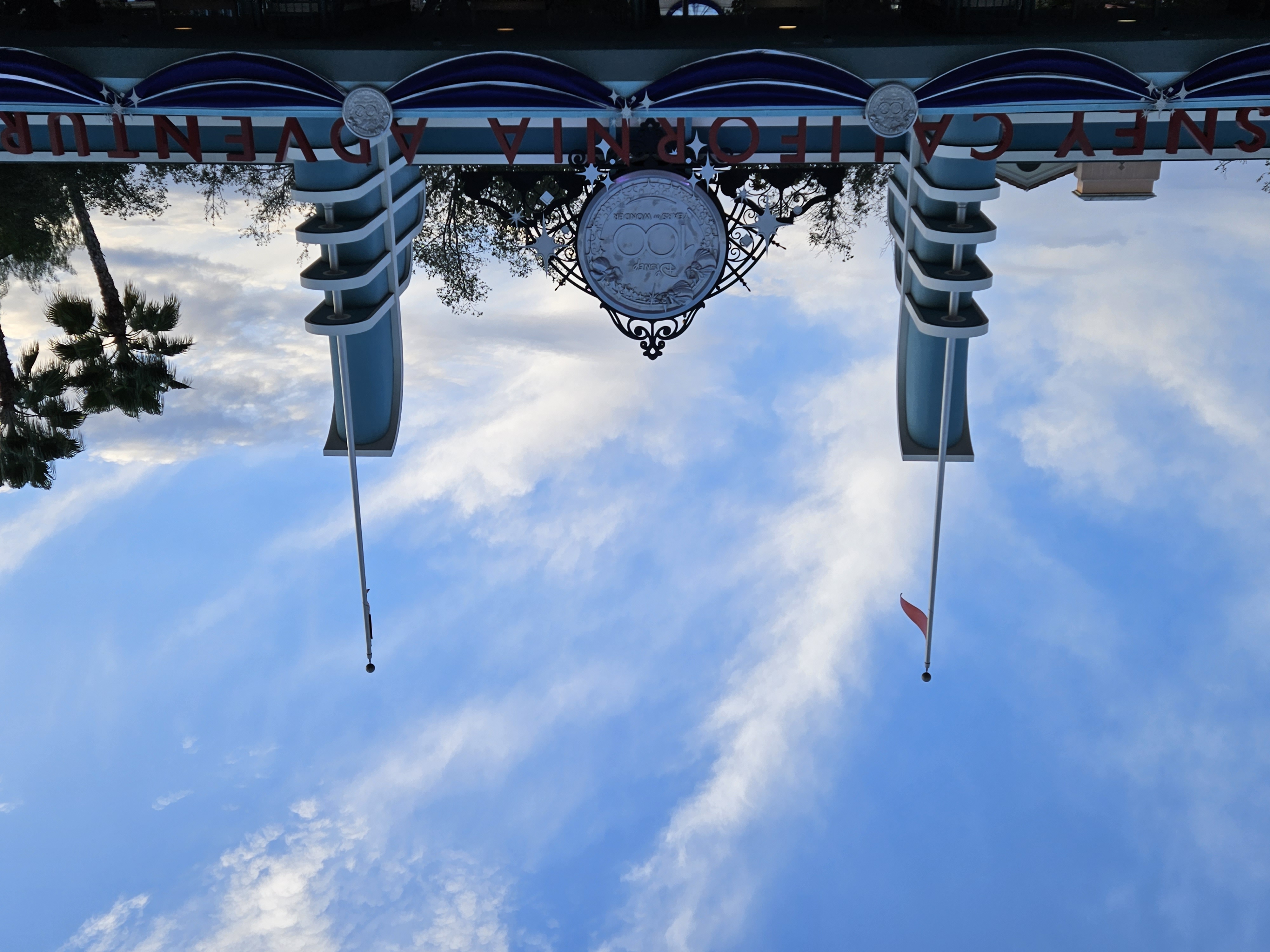 Disney 100 Years of Wonder sign above Disney California Adventure Park at 1X