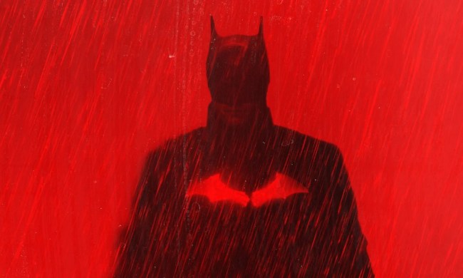 Robert Pattinson as the Dark Knight in red promo art for The Batman.
