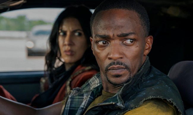 John Doe and Quiet in the car looking at something in a scene from Twisted Metal.